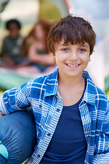 Image showing Sleeping bag, camping or portrait of happy boy in woods on adventure or holiday vacation in nature. Relax, start or kid with smile in park, garden or forest ready for fun hiking, travel or wellness