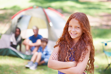 Image showing Child, portrait and fun at summer camp in outdoors, girl and relaxing on vacation or holiday. Happy female person, smiling and face or confident in park, childhood and adventure or joyful in nature