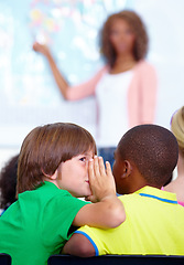 Image showing Little boys, whisper and classroom in ear at classroom for secret, gossip or communication at school. Male person, students or friends listening to rumor or surprise in class together with teacher