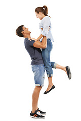 Image showing Happy couple, hug and lifting for love, support or care in relationship on a white studio background. Man and woman smile in joy for embrace, marriage or affection together in trust on mockup space