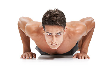 Image showing Man, portrait and push up or exercise in studio, core and cardio workout for muscle development. Male person, athlete and face by white background, bodybuilding and performance challenge or fitness