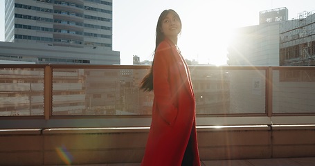 Image showing Japanese woman, city and happiness on bridge in fashion, weekend and relax wellness in urban area. Young person, smile or trendy clothes for trip on holiday adventure, tokyo town or office buildings