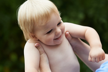 Image showing Toddler, mother and playing outdoor for development with nurture, relationship and bonding for happiness. Family, child or baby and hands with early childhood, parenting and love at park in nature