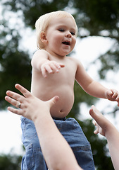 Image showing Toddler, mother and playing outdoor for development with nurture, relationship and bonding for happiness. Family, child or baby and hands with early childhood, parenting and love at park in nature