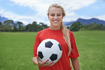 Image showing Woman, soccer player and portrait with ball, confidence and football field for match, competition or game. Fitness, practice and ready for training, outdoor and exercise for athlete, strong or sport