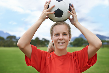 Image showing Happy woman, portrait and soccer ball for sports game, throw or playing match in exercise on green grass. Face of young female person or football player smile in training or practice on outdoor field
