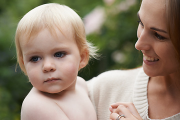 Image showing Outdoor, mom and holding baby in garden with love and support in backyard. Infant, bonding and relax with mother in nature together and carrying kid with care in hug or embrace in environment