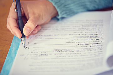 Image showing Test, quiz and hand of teacher on paper grading and writing on desk with pen for education. Exam, closeup and person on table working with questions, answer and results of student assessment