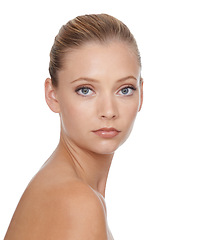 Image showing Woman, portrait and beauty with skincare in studio for glowing face, wellness and dermatology or serious. Model, person or confidence with cosmetics, collagen or botox treatment on white background