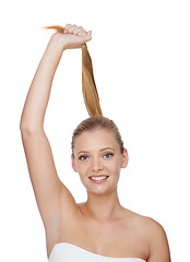 Image showing Woman, portrait and beauty with hair care in studio for cosmetics, keratin treatment and shampoo shine. Model, person and confidence with skincare, collagen texture and hairstyle on white background