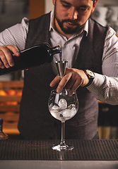 Image showing Barman making an alcoholic drink