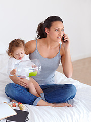 Image showing Multitasking, phone call and mom with baby in home talking for remote work and child with toys on bed, Freelance, mother and speaking on smartphone, communication and caring for kid in bedroom