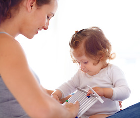 Image showing Mom playing with baby girl in home with toys, bonding and child care with support in morning on bed. Happy woman, playful toddler and fun together in bedroom with development, smile and abacus