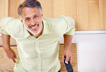 Image showing Portrait, happy or mature man with phone for social media, message or news with notification or smile. Technology, top or senior entrepreneur with mobile app for networking, communication or text