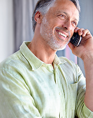 Image showing Mature, smile or happy man on a phone call listening or talking for communication to relax. Confident, retirement or male senior person in home calling to chat in conversation or speaking on mobile