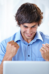 Image showing Man, laptop and celebrate with fist, success and smile for target goal, happiness and office. Winner, adult and email for achievement, bonus and milestone for business, finance profit and promotion