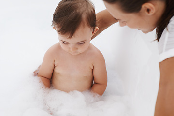 Image showing Baby, mother and foam soap for washing in bathroom, bath and cleaning for skincare at home. Mommy, toddler and childcare or water for prevention of bacteria and virus, cosmetics and liquid for health