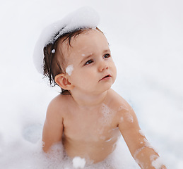 Image showing Baby, hygiene and foam for washing in bathroom, bath and cleaning for skincare at home. Girl, toddler and childcare or water for prevention of bacteria and virus, cosmetics and shampoo or soap
