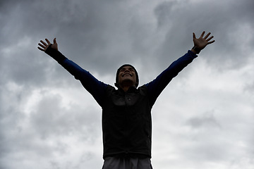 Image showing Happy man, sky or hands up for fitness celebration in training, exercise or workout success. Excited, proud athlete or healthy hiker with silhouette, gratitude or freedom to explore nature outdoors