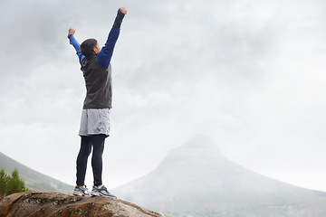 Image showing Man, hiking and celebrate on mountain peak and back with progress, exercise and workout. Hiker, fitness and climber for training, victory and success to explore, hobby and health in outdoors