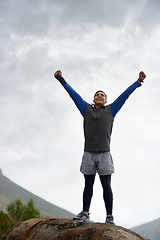 Image showing Man, hiker and adventure on mountain peak and happy with progress, exercise and workout. Hiking, fitness and climber for training, forest and nature to explore, hobby and success in sport outdoors