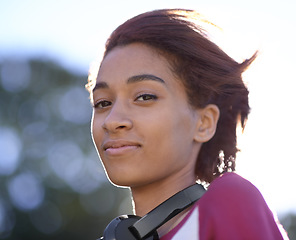 Image showing Portrait, student and woman at park with headphones at university campus outdoor in nature. Face, music and beauty of young girl or person with tech for listening to audio, song or sound in Brazil