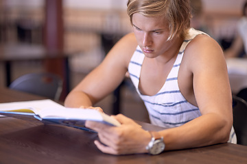 Image showing University, studying and man with books for education, learning and research with knowledge in library. Reading, college and male student with textbooks for assignment, project and test on campus