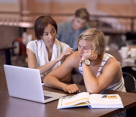 Image showing Students, laptop and man overwhelmed with university study, team research or learning for exam. Anxiety, mental health and learner depressed over college workload, school project or education crisis