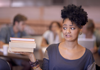 Image showing Books, education and woman nervous for university, academy crisis and school workload for philosophy study. College, campus and student worry over learning literature, knowledge or textbook pile