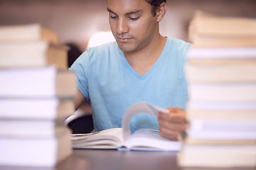 Image showing Education, university and man reading books for academy course, knowledge or studying for scholarship exam. College, textbook or Indian student learning literature, story and school research project