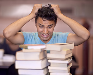 Image showing Student man, stress and stack of books for education, development and pulling hair at college library. Person, learning and knowledge with anxiety, fear and mental health for assessment at university