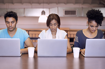 Image showing University, typing and people in library on laptop for internet research, studying and online learning. Education, college and men and women with textbooks, computer and reading website for knowledge