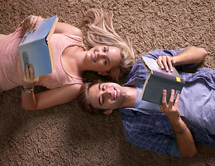 Image showing Above students, portrait and floor for studying, scholarship or happy for development at university. People, education and textbook with smile for knowledge, information or research at college campus
