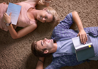 Image showing Above students, books and floor for studying, scholarship or happy for development at university. People, education and textbook with smile for knowledge, information or research at college campus