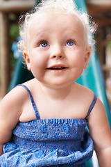 Image showing Baby, girl and child in home, happy and healthy kid alone in her house or kindergarten nursery. Face, cute blonde toddler and smile while playing, adorable and innocent facial expression of childhood