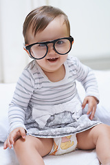 Image showing Eye care, portrait or baby with vision glasses for eyesight, prescription lens frame or ocular support. Accessory, pediatric ophthalmology and infant toddler relax, silly and playing with eyeglasses