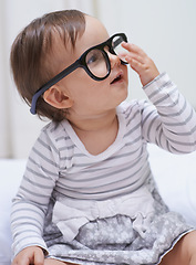 Image showing Eye care, vision and young baby with glasses for eyesight, prescription lens frame or ocular support. Face accessory, pediatric ophthalmology and relax youth girl, infant or toddler with eyeglasses