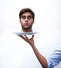 Image showing Head, plate and face of business man punishment for company mistake, corporate crisis or agency fail. Studio dish, decapitation and hand serving professional agent after disaster on white background