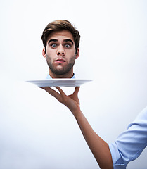 Image showing Head, plate or portrait of business man punishment for company mistake, corporate crisis or fail. Studio dish, decapitated or hand serving shocked enemy after conflict for warning on white background