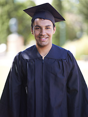 Image showing Happy man, portrait and outdoor graduation for qualification, learning or career ambition in education. Male person, student or graduate smile for higher certificate, diploma or degree in nature