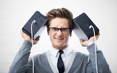 Image showing Face, database and storage on hard drive with man in studio on gray background for safety or security. Portrait, cloud computing and glasses with nerd or geek IT professional holding equipment