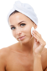 Image showing Beauty, portrait or woman in studio with cotton pad on face, cosmetics or makeup cleaning product. Dermatology, remove or wellness for model with skincare, toner or facial glow on white background