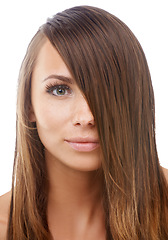 Image showing Hair care, beauty and portrait of woman in a studio for shine, health and natural treatment. Salon, wellness and young female person from Canada with routine for hairstyle by white background.