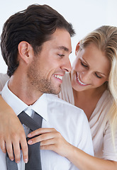 Image showing Smile, love and tie with couple dressing together in morning for help, romance or bonding. Fashion, style or clothes and businessman getting ready for work with wife in studio on white background