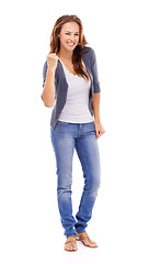 Image showing Fashion, celebrate and portrait of woman in studio with casual, trendy and stylish outfit for winning. Happy, success and young female winner from Canada with style isolated by white background.