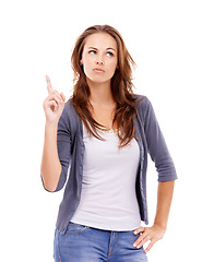 Image showing Pointing, confused and young woman in a studio with mockup for marketing, promotion or advertising. Guess, mock up and female person from Canada with show hand gesture isolated by white background.