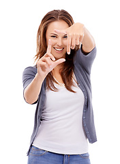 Image showing Portrait, woman and finger frame in studio to review profile picture, creativity and composition on white background. Happy model planning perspective with hands for photography of perfect selfie