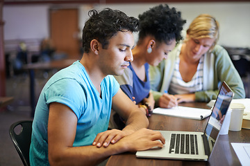 Image showing Man, laptop or group of students studying in university, college or school campus for education. Focus, elearning or smart people with scholarship in library reading news, research or online course