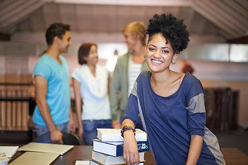 Image showing Portrait, confident or happy woman in a library for knowledge or school development for future. Scholarship, education or female student with smile or books for studying or learning in college campus