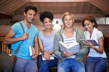 Image showing Library, students and group at university in portrait, people and books for development at academy. Friends, reading and happy for learning with studying, scholarship or education for test at college